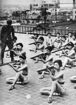 back-then:  Japanese girls receiving shooting training during