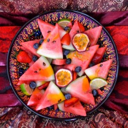 rawberry-fields:  All of my favourite things in a bowl 🍉🍓🌺