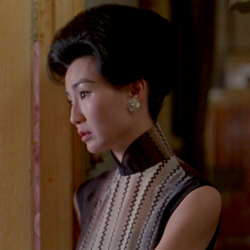 hoanbee:  Maggie Cheung wears a different cheongsam (qipao) dress