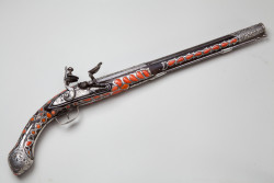 peashooter85:  An ornate silver and coral mounted flintlock pistol