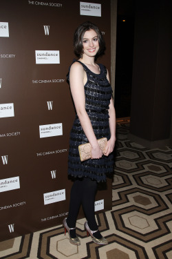 celebhosierydaily:  Anne Hathaway in black tights.