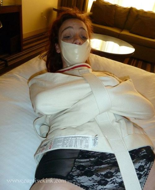 thegagproject:  I do love microfoam tape!! :D #tapegagged #submissive #gagged #helpless #straightjacket 