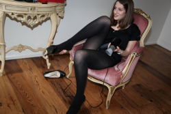 tightsobsession:  Candid black opaque tights. 