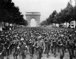 supernugget42:  American soldiers marching through Paris after