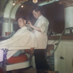 elclinto:  My grandpa cutting hair in his barber shop. Cheyenne,