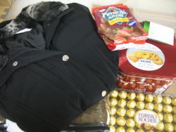 Black winter coat, a blanket, 贄 gift card and more sweets