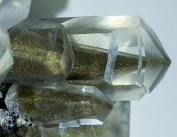 underthescopemin:  Calcite with Pyrite Aggregate on matrix of