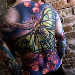 tattoosnob:  Cherry Butterfly by @sandradaukshta at Evolve Tattoo