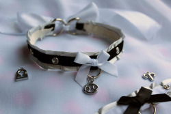 kittenribbonsshop:  Black and silver zodiac collar! Super cute