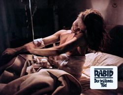 German lobby card for David Cronenberg’s Rabid, released