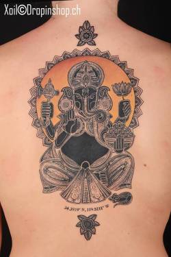 tattoofilter:  Ganesha tattoo on the back. Tattoo artist: Xoïl