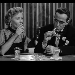 wehadfacesthen:  Gloria Grahame and Humphrey Bogart in In a Lonely