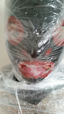 Slave Qwerty has an encasement fetish, so I wrapped him up in some cling film, and teased his cock with a vibrator. London, April 2015.