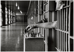 history-inpictures:  Two inmates, one black and one white, playing