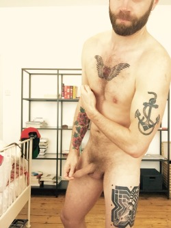 ginger-kicks:  Fascinated by his ink…and the rest.