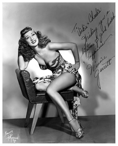 Winnie Garrett       aka. “The Flaming Redhead”.. Vintage 50’s-era promo photo personalized: “To Vickie & Charlie — Wishing you a lifetime of good health & happiness — Winnie Garrett”