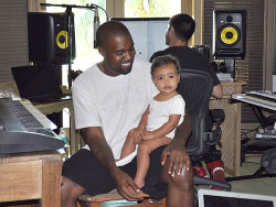  “Kanye sat there with his family, holding his daughter