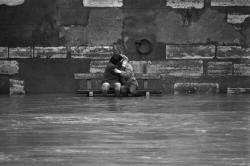 collectivehistory:  A couple kissing during the flooding of the