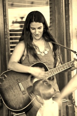 Busking in Ybor 2010. That little kid has a fork ghost hand.