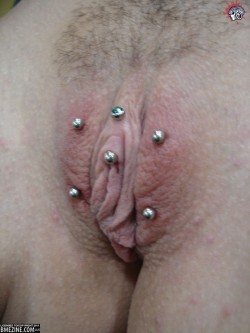 pussymodsgaloreShe has a VCH piercing, and unusually, two barbells