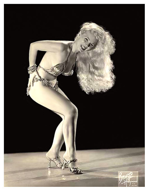 Mitzi       aka. “The Dream Girl”.. Born in Chicago in 1917 to parents who danced professionally, she literally grew up on the vaudeville circuit.. By the 1930’s, her parents retired to open a dance school in Toledo; and Mitzi began performing