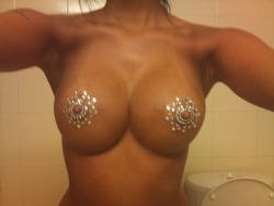 Titty Jewelry. Nice how the surgeon got the implants in nice