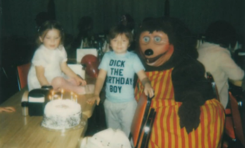 skeletonsiro:  With how spooky Weekend at Freddy’s is, I hope people are going back and looking at real life scary food mascots like the Showbiz Pizza Bear.  For extra creepiness, the kid’s shirt says “DICK THE BIRTHDAY BOY”  o.O