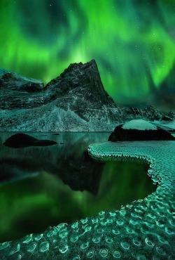 Otherworldly (Aurora Borealis over a frozen lakeside)