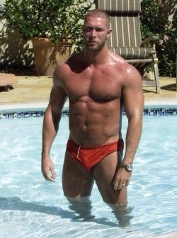 greenspeedos:  rugged red hunk  Muscular, nice pecs, and a bulge
