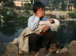sixpenceee: A boy in Nepal being evicted from his home A boy