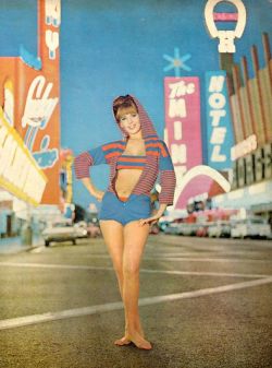 vintagelasvegas:  Modeling a swimsuit on Fremont St, from LIFE,