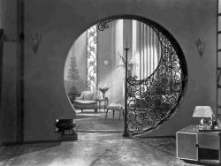shi-saa:    a round-shaped interior doorway with an   art nouveau