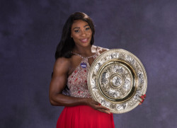 thepowerofblackwomen:    Serena Williams poses with the trophy