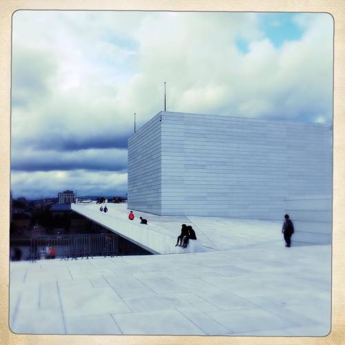 <p>Well, isn’t this something? From the roof of the new opera house, Oslo is up up up in the clouds. And side note to Americans - they just have a small sign that says you’re not allowed to skateboard up there because it’s dangerous and no one does. Whatever that means. #Oslo #motherdaughterroadtrip #operahouseoslo #lawabidingcitizens  (at Oslo Opera House)</p>