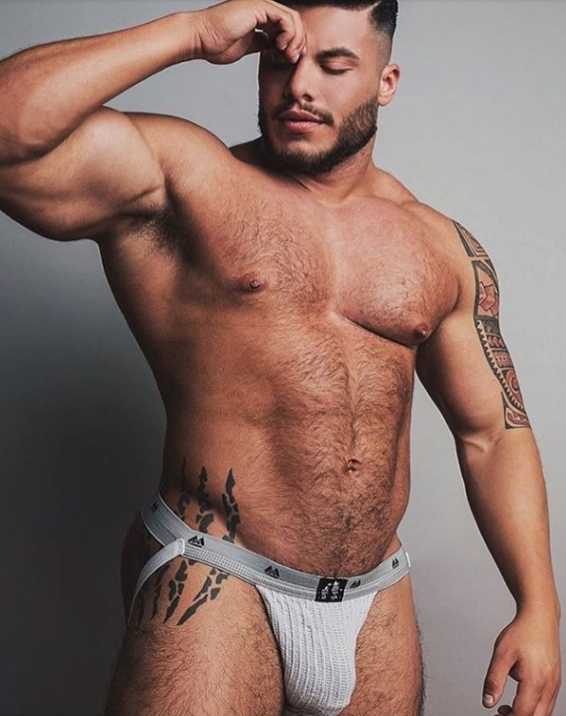 dadswankbank:sexymenmmmm:Swim strap, tats, fur, muscle, handsome