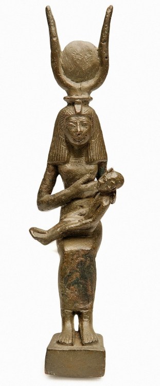 amntenofre:    bronze statuette of the Goddess Isis enthroned suckling Horus the Child.From Saqqara (necropolis of Memphis, I nome of Lower Egypt), ca. 712–332 BCE. Now in the Manchester Museum…    The Great Mother’s nourishment