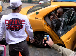 kimkanyekimye:   Kanye in Soho, New York, taking a photo of a