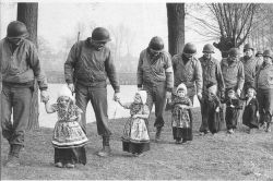 picturesintheattic:  Little Dutch girls escort American soldiers