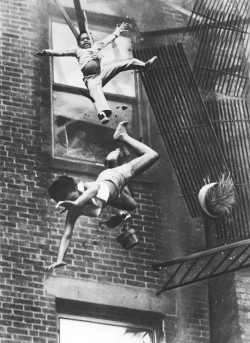  Two girls falling when the ladder collapsed during a fire emergency,