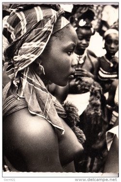 Liberian woman. Via Delcampe.   