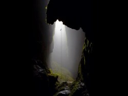 Descent into dark (abseiling 330 feet into Lost World cavern,
