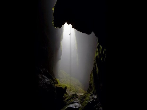 Descent into dark (abseiling 330 feet into Lost World cavern, Waitomo Caves, New Zealand)