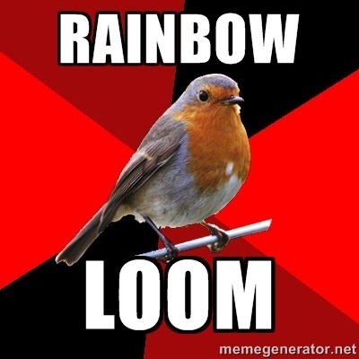 fuckyeahretailrobin:  [Image Description: Background is several triangles in a circle like a pie alternating from true red, scarlet and black. A robin is sitting on his perch looking to the right.Top Text: “RAINBOW.”Bottom Text: “LOOM.”]   Craft