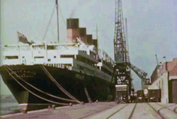 twostriptechnicolor: The RMS Aquitania heads to the ship breakers,