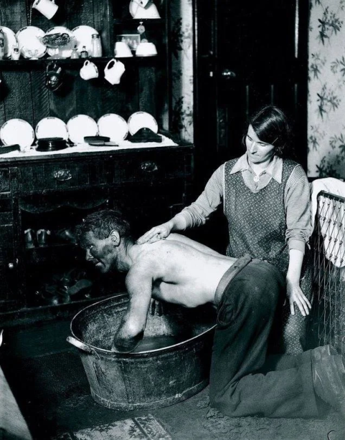 historical-nonfiction:  Welsh woman helping her husband wash