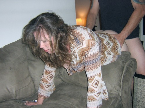 hotwifephotos:  I usually don’t post couple shots but this one feels right. I can imagine the husband taking this photo of his wife bent over their living room couch obviously enjoying another man’s cock deep in her pussy. 