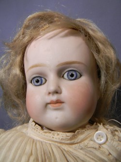 hazedolly: A pretty, spooky antique bisque dolly with piercing