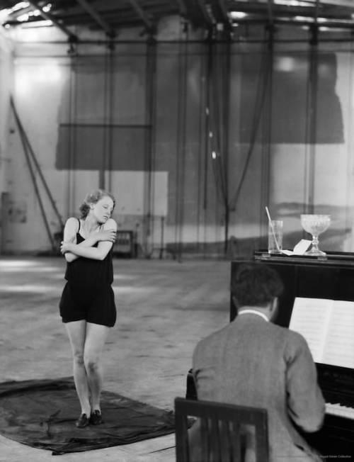 Brigitte Helm  rehearsing to piano music at UFA Studios, 1928.