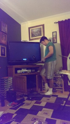 My boyfriend, fiddling with my computer and HDMI cord so my mother