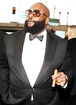 I fuck wit Rozay but that poor button is screaming for help.